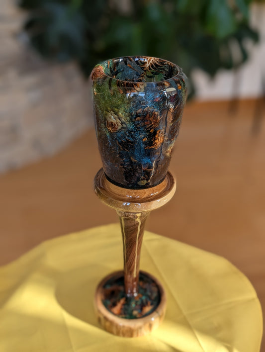 Tall vase made of wood, pinecones and epoxy.