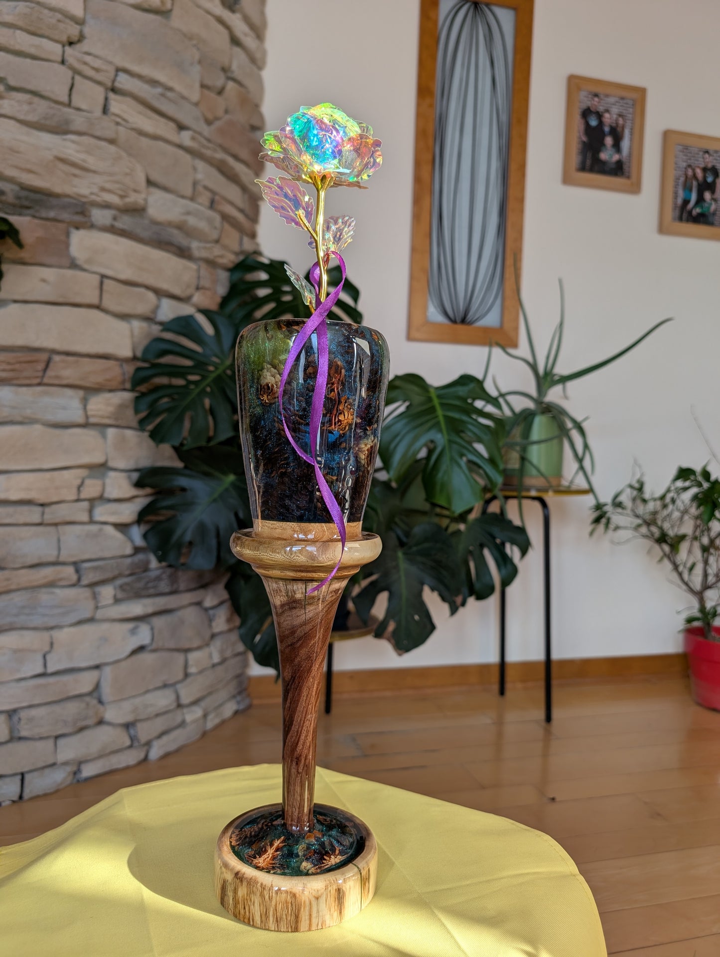 Tall vase made of wood, pinecones and epoxy.